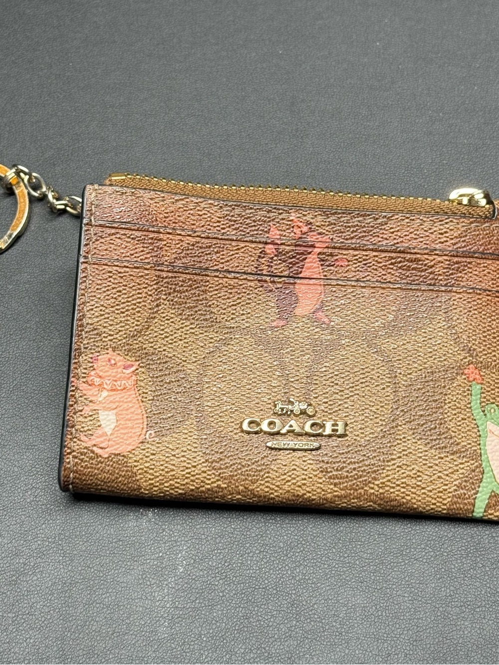 Coach Brown Signature Zip Card Case with Gold Logo and Playful Print
